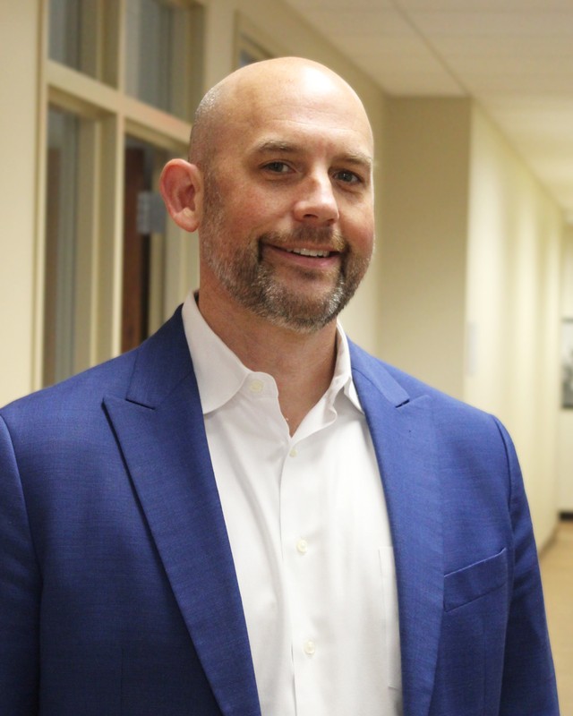 Portrait of Brian Handley, Co Founder of WON VET™, wearing a blue jacket